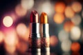 Bright lipstick of different colors shades of colored lipstick for lips. Professional makeup tool, blurred background Royalty Free Stock Photo