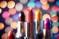 Bright lipstick of different colors shades of colored lipstick for lips. Professional makeup tool, blurred background Royalty Free Stock Photo