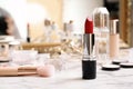Bright lipstick on dressing table. Royalty Free Stock Photo