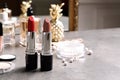 Bright lipsticks on dressing table Royalty Free Stock Photo