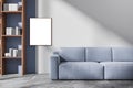 Bright living room interior with empty white poster, blue sofa Royalty Free Stock Photo