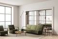 Bright living room interior with two armchairs, sofa, panoramic window Royalty Free Stock Photo