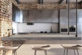 Bright loft brick kitchen interior.