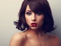 Bright makeup beautiful woman with short black hair style looking