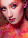 Bright makeup and face art, close-up portrait. Creative makeup,