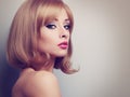 Bright makeup profile of beautiful woman with blond short hair l