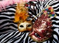 Bright masquerade masks on retro chair