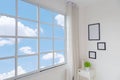 Bright modern bedroom interior with blue sky Royalty Free Stock Photo