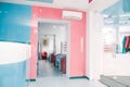 Bright modern interior of waiting hall with reception and wardrobe zones. Selective focus Royalty Free Stock Photo