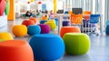 Bright Modern Office Interior with Colorful Stools and Furniture in Open Royalty Free Stock Photo