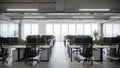 Bright Modern Open- Plan Office Interior with Rows of Desks Computers and Large Windows Overlooking City Skyline Royalty Free Stock Photo