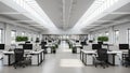 Bright Modern Open Plan Office Interior with Rows of Desks and Natural Light from Skylights Royalty Free Stock Photo