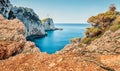 Bright morning view of Cape Lefkatas with old lighthouse.