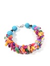 Bright multi-colored bracelet made of natural stones on a white background.