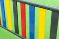 Bright multi-colored fence of a playground for children close-up Royalty Free Stock Photo