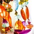 Bright multi-colored glass beads closeup. Blur and abstraction