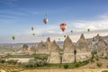 Bright multi-colored hot air balloons flying in sunsrise sky Royalty Free Stock Photo