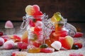 Bright multi-colored jelly candies in glass jar, selective focus Royalty Free Stock Photo