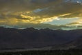 A bright multi-colored sunset sky over the Himalayan mountains Royalty Free Stock Photo