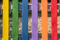 Bright and multi colorful wooden fence on children& x27;s playground Royalty Free Stock Photo