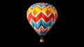 Bright multicolored hot air balloon with zigzag pattern on white background Royalty Free Stock Photo