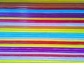 Bright multicolored painted metal roller blinds background. Closed corrugated shutters door rainbow texture Royalty Free Stock Photo