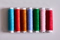 Bright Multicolored Sewing Thread Spools Row Royalty Free Stock Photo