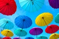 Bright multicolored umbrellas in the sky