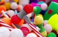 Bright multicoloured plastic toy hammers and bunting for celebrating the feast of St. John the Baptist in Porto, Portugal