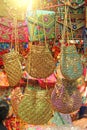 Bright national Indian colored bags are sold in the market of bazaars in India, Goa. Souvenirs Gifts India. Hand embroidery in