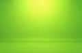 Bright neon lime green background with soft yellow light at top. Smooth gradient studio backdrop, empty room stage. Clean, modern Royalty Free Stock Photo