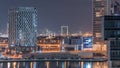 Bright night in Dubai near canal aerial timelapse Royalty Free Stock Photo