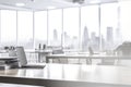 Bright office with desk and laptop