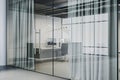 Bright office interior with reception desk, glass partitions and curtains. Waiting area concept. Royalty Free Stock Photo