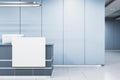 Bright office lobby interior with empty white mock up banner and other items. Royalty Free Stock Photo