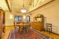 Bright, open and warm dining room with vaulted ceilings