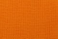 Bright orange background from textile material. Fabric with natural texture. Royalty Free Stock Photo