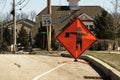 Bright orange and black flagger or flagman sign