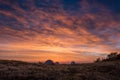 Bright Orange Clouds Glow Above Three Tents Royalty Free Stock Photo