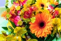 Bright orange gerbera in a bouquet of flowers. Beautiful bouquet gift for the holiday.
