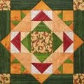 Bright orange-green geometric patchwork block from pieces of fabrics Royalty Free Stock Photo