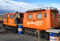 Bright orange Hagglund snowcat and trailer. Yorkshire