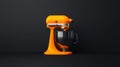 Bright orange kitchen mixer with glass bowl on dark background Royalty Free Stock Photo