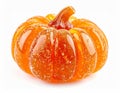 Bright Orange Pumpkin Adorned with Sugar Crystals on a White Background Royalty Free Stock Photo