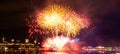 Bright orange and red fireworks in front of Quebec City Royalty Free Stock Photo