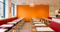 Bright Orange Restaurant Interior with Rows of Tables and Booth Seating dining Royalty Free Stock Photo