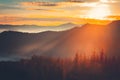 Bright orange sunrise over mountain range forest Royalty Free Stock Photo