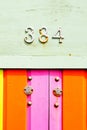 384 on bright painted wood Royalty Free Stock Photo