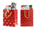 Bright paper shopping bags with gifts on background Royalty Free Stock Photo