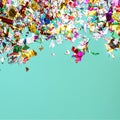 Party confetti on neo mint color background.